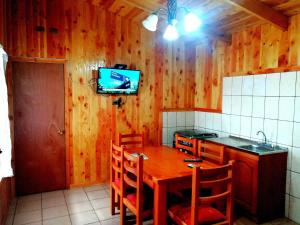 Kuchyň nebo kuchyňský kout v ubytování Hotel Catripulli