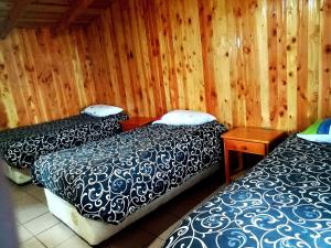 Postel nebo postele na pokoji v ubytování Hotel Catripulli