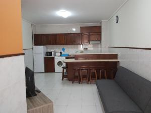 Virtuve vai virtuves zona naktsmītnē Apartament Pedro&Pérolla