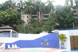 Bazén v ubytování girardot resort apto102 nebo v jeho okolí
