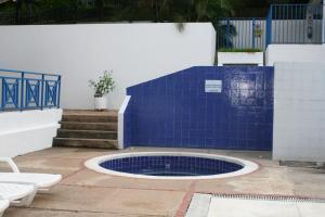 Bazén v ubytování girardot resort apto102 nebo v jeho okolí