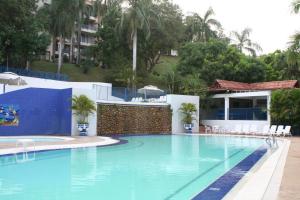 Bazén v ubytování girardot resort apto102 nebo v jeho okolí