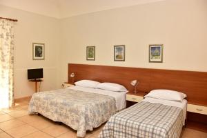 En eller flere senge i et værelse på Affittacamere Sestiere Santa Caterina + 29 billeder