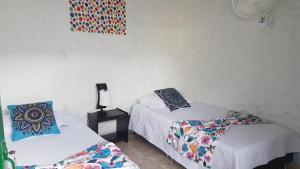 Postel nebo postele na pokoji v ubytování Villa Apolonia
