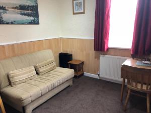 Istumisnurk majutusasutuses Lindisfarne Holiday Apartments - Families & Couples Only
