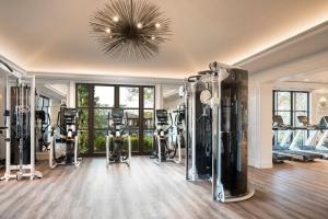 a gym with a lot of treadmills and machines at Four Seasons Resort Orlando at Walt Disney World Resort in Orlando