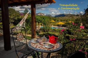 A piscina localizada em Pousada Villa Lagoa das Cores ou nos arredores