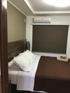 Ein Bett oder Betten in einem Zimmer der Unterkunft Ocio Apart