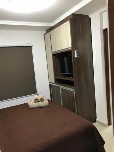 Ein Bett oder Betten in einem Zimmer der Unterkunft Ocio Apart