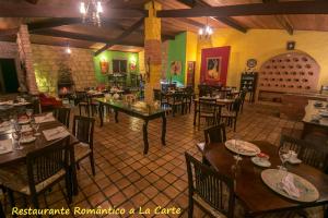 Um restaurante ou outro lugar para comer em Pousada Villa Lagoa das Cores