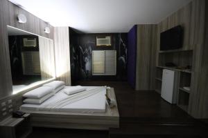 Cama ou camas em um quarto em Snob Motel (Adult Only)