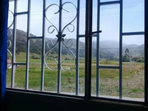 Afbeelding uit fotogalerij van Hospedaje Puerta al Lago in Suse +36 foto's