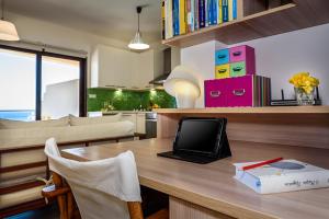 A television and/or entertainment centre at Platanias Sky View