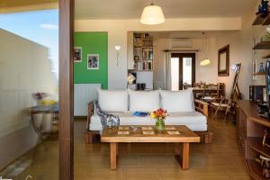 A seating area at Platanias Sky View