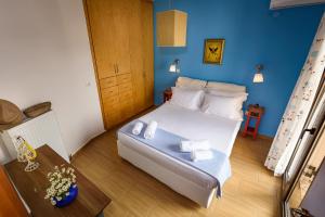 A bed or beds in a room at Platanias Sky View