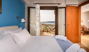 A bed or beds in a room at Platanias Sky View