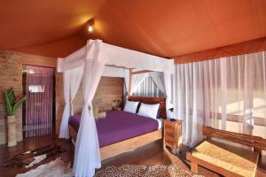 Postel nebo postele na pokoji v ubytování Sang Giri Mountain Tent Resort + 37 fotografií