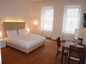 Postel nebo postele na pokoji v ubytování Apartment Nestroygasse