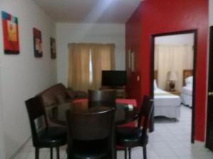 TV o dispositivi per l'intrattenimento presso Apartamentos del Puerto