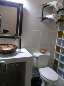 Vonios kambarys apgyvendinimo įstaigoje Apartamentos del Puerto