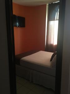 Letto o letti in una camera di Apartamentos del Puerto