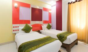 Tempat tidur dalam kamar di Itsy By Treebo - Worldtree Bellandur