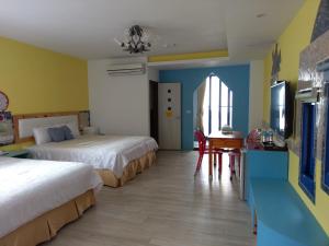 Postel nebo postele na pokoji v ubytování Sky Blue Ocean B&B