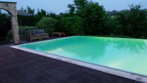 Der Swimmingpool an oder in der Nähe von Villa Giotto