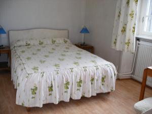 Postel nebo postele na pokoji v ubytování Hôtel Modern