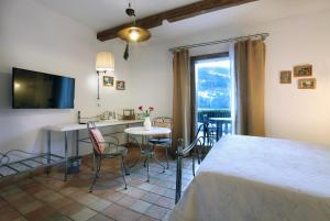 TV a/nebo společenská místnost v ubytování Hotel Autantic