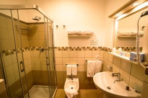 Koupelna v ubytování Hotel Oriente