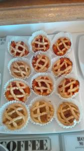 a tray of cupcakes in paper muffins at AL 32 B&B in Massa Marittima