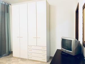 TV a/nebo společenská místnost v ubytování Casa Vacanze Basilicata da Giannino