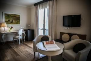 TV a/nebo společenská místnost v ubytování Villa Giorgia Albergo in Collina