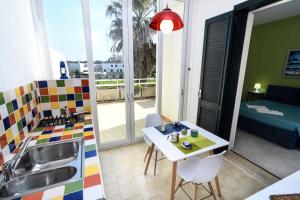 A balcony or terrace at B&B Villa Genny a pochi passi dal mare