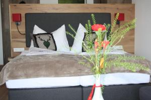 Łóżko lub łóżka w pokoju w obiekcie Hotel Aberseehof