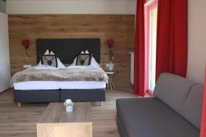 Łóżko lub łóżka w pokoju w obiekcie Hotel Aberseehof