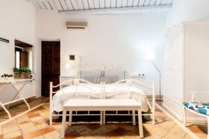 Letto o letti in una camera di A 50 passi dal Tempio di Apollo