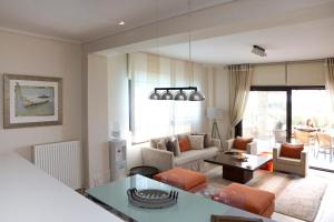 Posedenie v ubytovaní DreamView Luxury 4br Villa