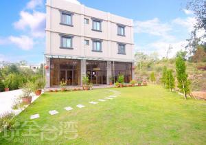 Ein Garten an der Unterkunft Kinmen Line In Bed and Breakfast