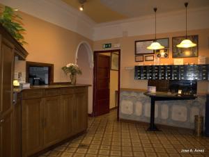 Kuchyň nebo kuchyňský kout v ubytování Hostal Orejas