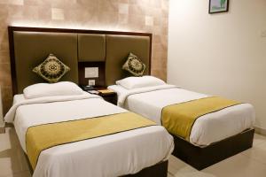 Postel nebo postele na pokoji v ubytování Hotel Winsar Park + 37 fotografií