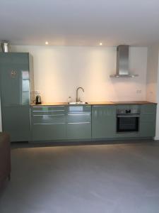 Dapur atau dapur kecil di Het Hart +23 gambar