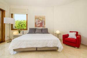 Cama o camas de una habitación en Villa Arabella