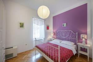 Posteľ alebo postele v izbe v ubytovaní Kredo B&B