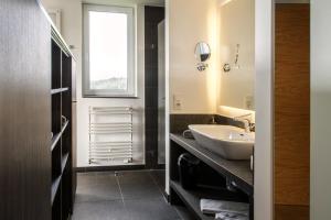 Postel nebo postele na pokoji v ubytování BURGHOF - DAS HOTEL