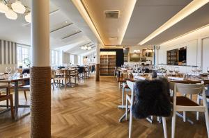 En restaurant eller et andet spisested på Gl. Avernæs Sinatur Hotel & Konference
