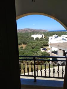 einen Blick vom Balkon eines Gebäudes in der Unterkunft Flamingo Apartments in Palekastro