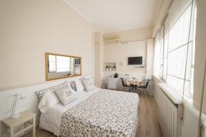 Postel nebo postele na pokoji v ubytování B&B Le Grazie + 48 fotografií