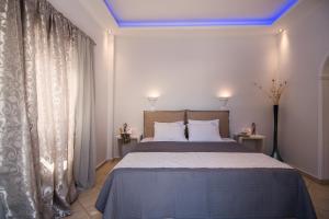 Postel nebo postele na pokoji v ubytování Anezina Villas